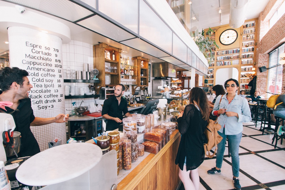 interior of a busy coffeeshop; new location concept